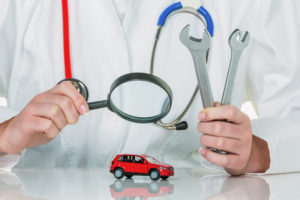 Doctor looking at car - South Bay Car Care - August 14 Blog